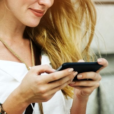 Woman on mobile dating app